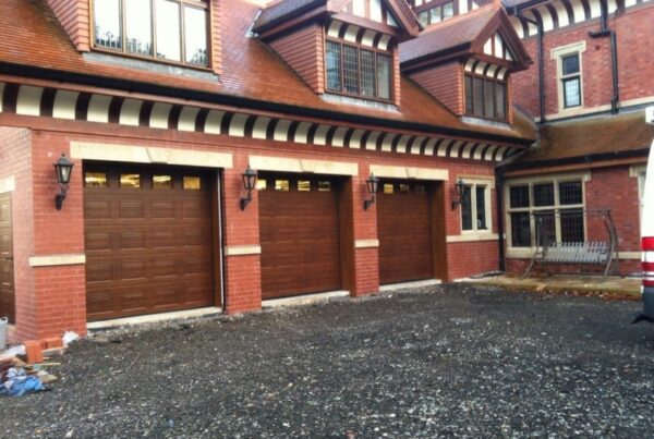 three brown sectional garage doors