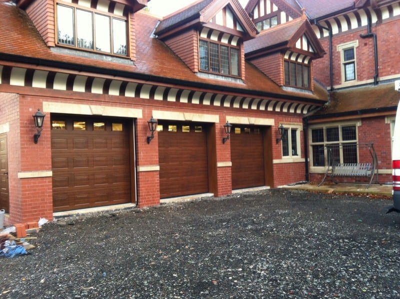 three brown sectional garage doors
